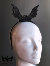 Black bat headband with glitter finish for Halloween parties, cosplay, and gothic costumes.
