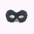 Black masquerade mask with sequin and bead detailing.