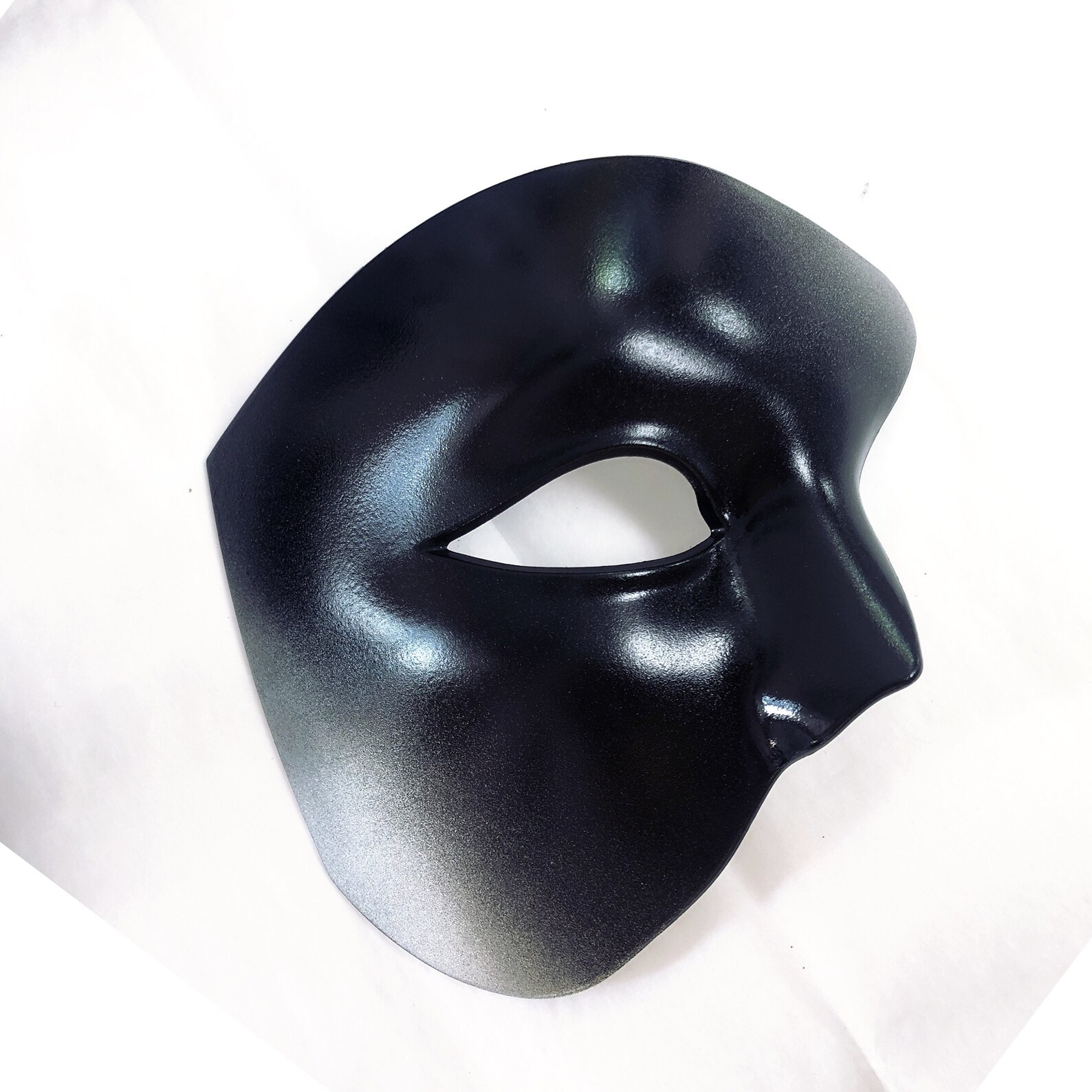 Black men masquerade masks with elegant Venetian details.