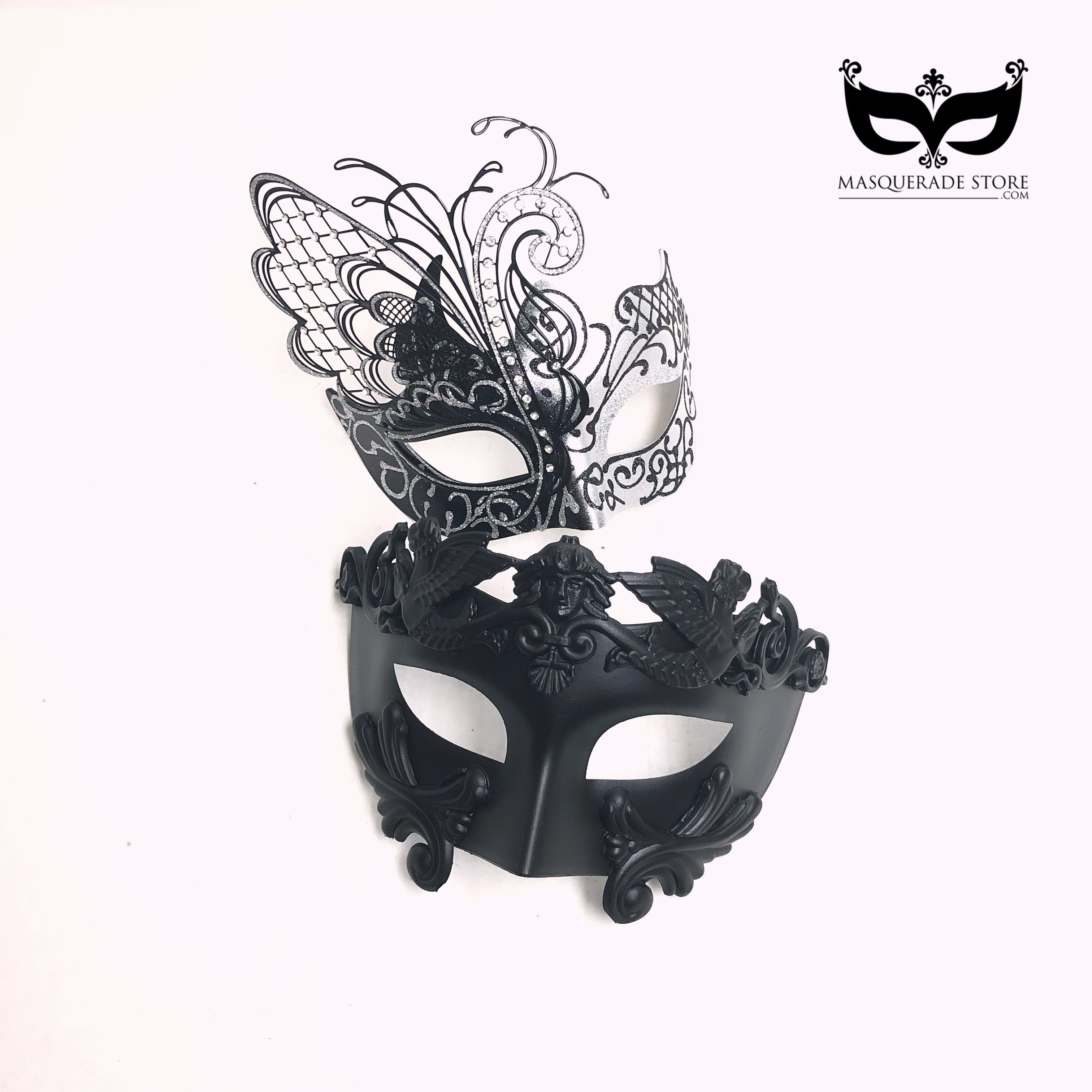Black and silver Venetian-style couples masquerade masks set with butterfly filigree women’s mask and baroque men’s mask.