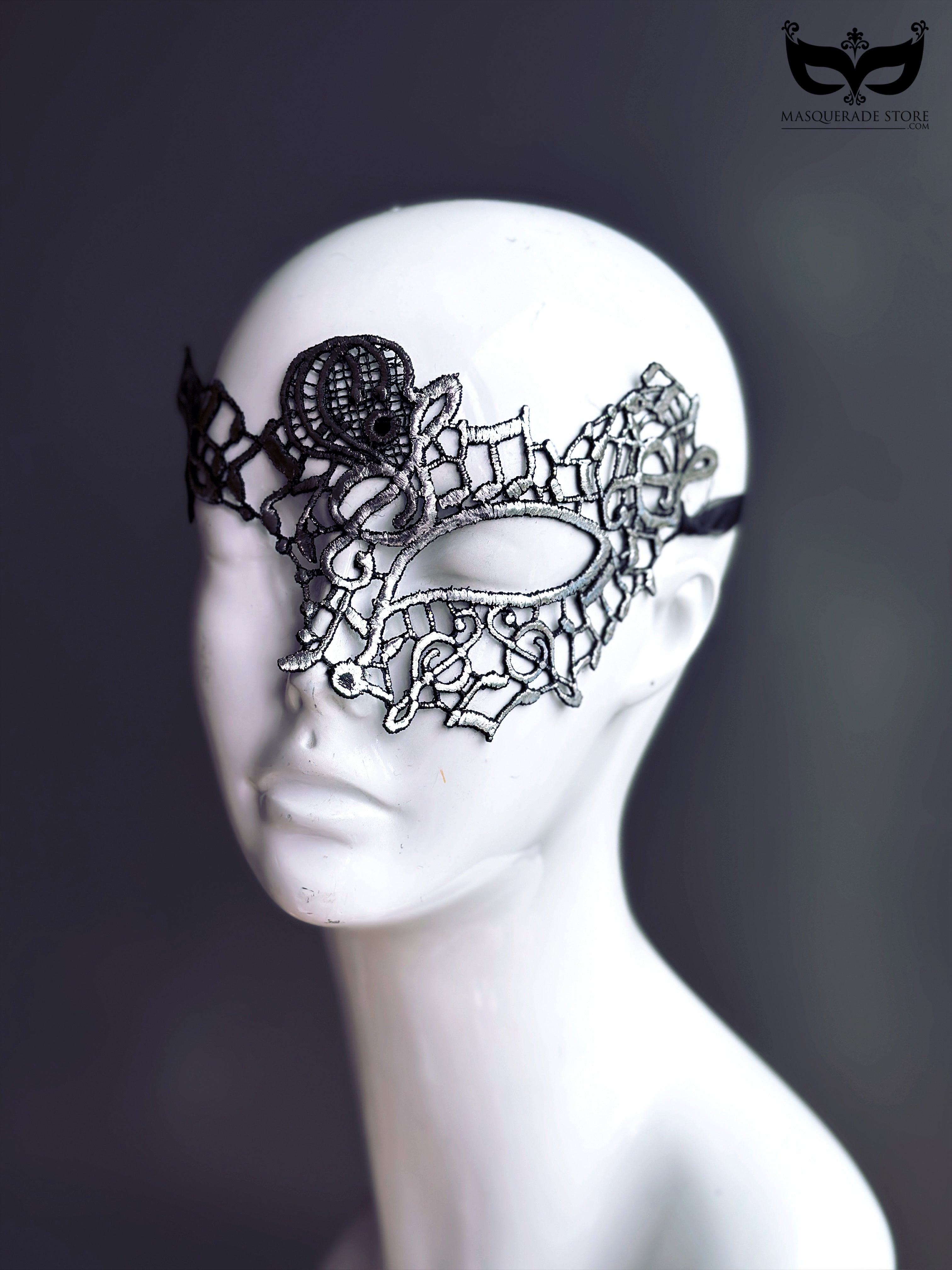 Black and silver lace masquerade mask with gothic detailing for women’s prom, ball, or Halloween party.