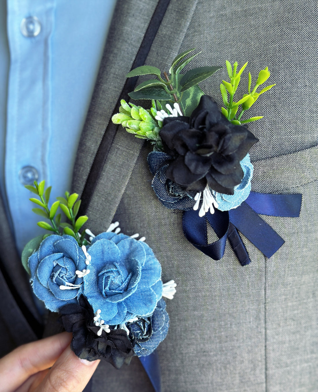 Blue and black floral boutonniere and corsage set for prom, weddings, and formal evening events.
