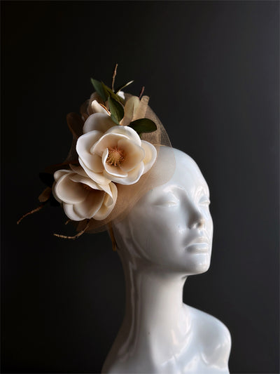 Elegant cream floral headpiece with large blooms and tulle base