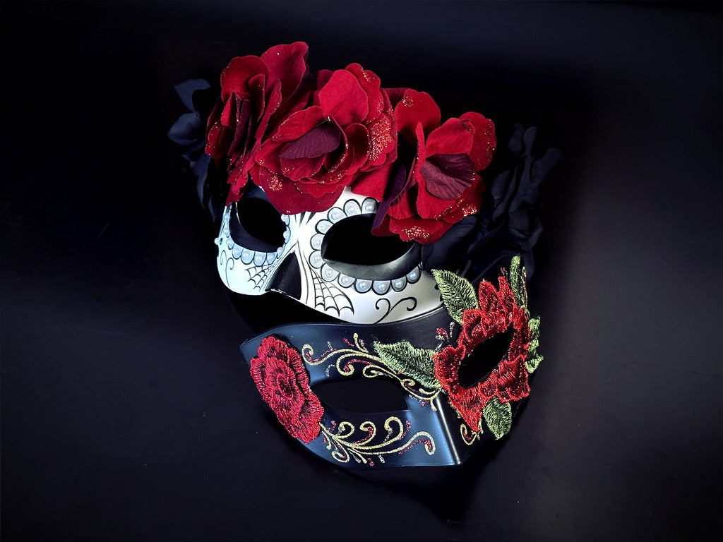 Gothic masquerade mask duo with Day of the Dead floral and skull elements in red and black for costume events.