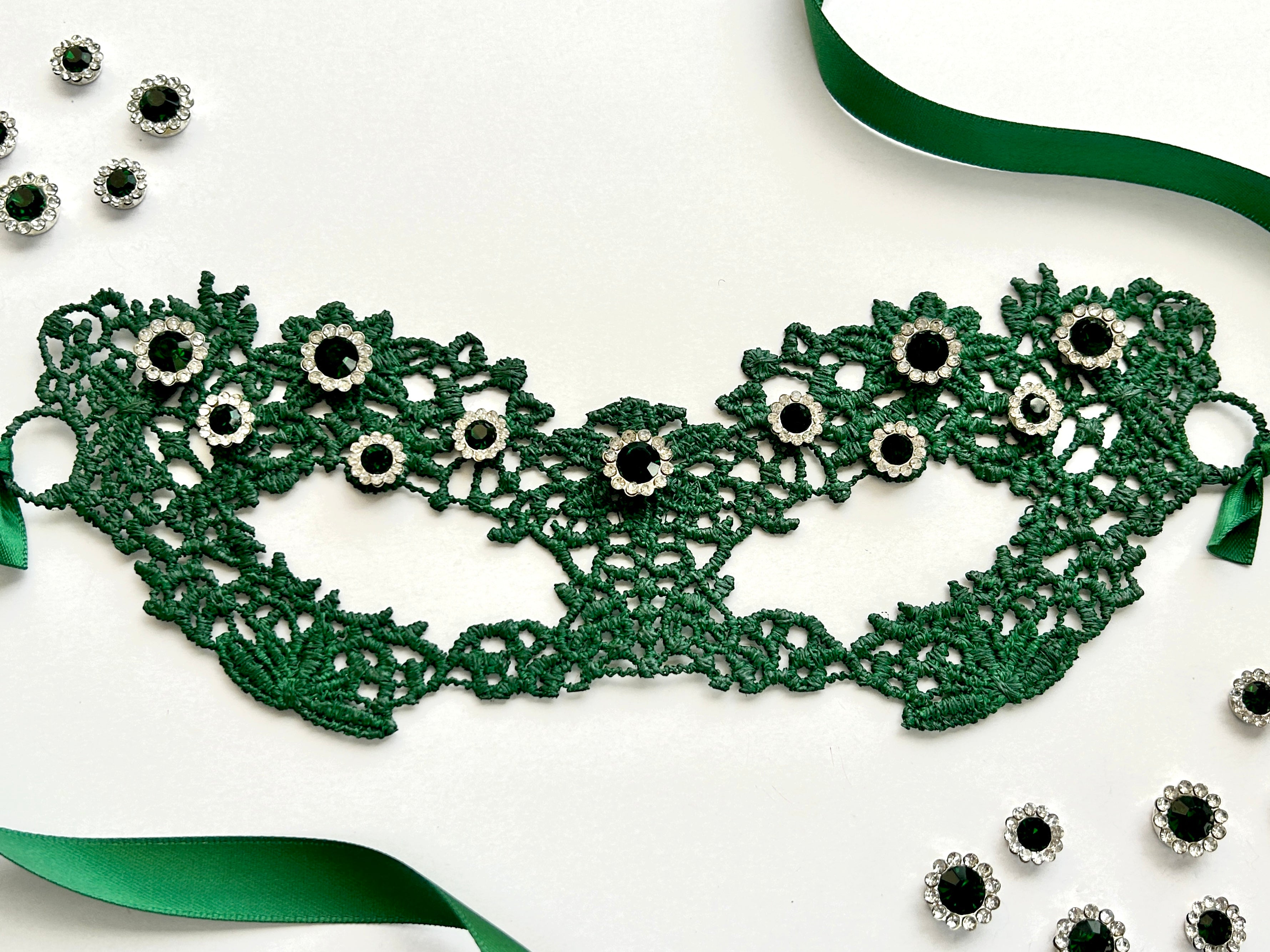 Emerald green floral lace masquerade mask with dark green rhinestones for velvet night gala and Venetian ballroom events.
