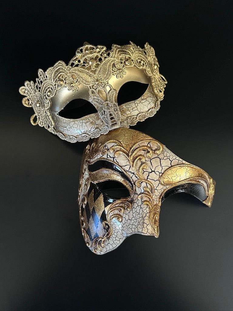 Matching gold masquerade mask set for couples featuring floral filigree and baroque finish