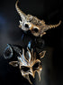 Gold and black horned masquerade masks for couples with ornate details and a bold, mythical style.