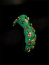 Festive green padded headband decorated with holiday gems and Christmas icons