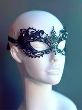 Green lace mask and inlaid with delicate rhinestones, perfect for any masked event!