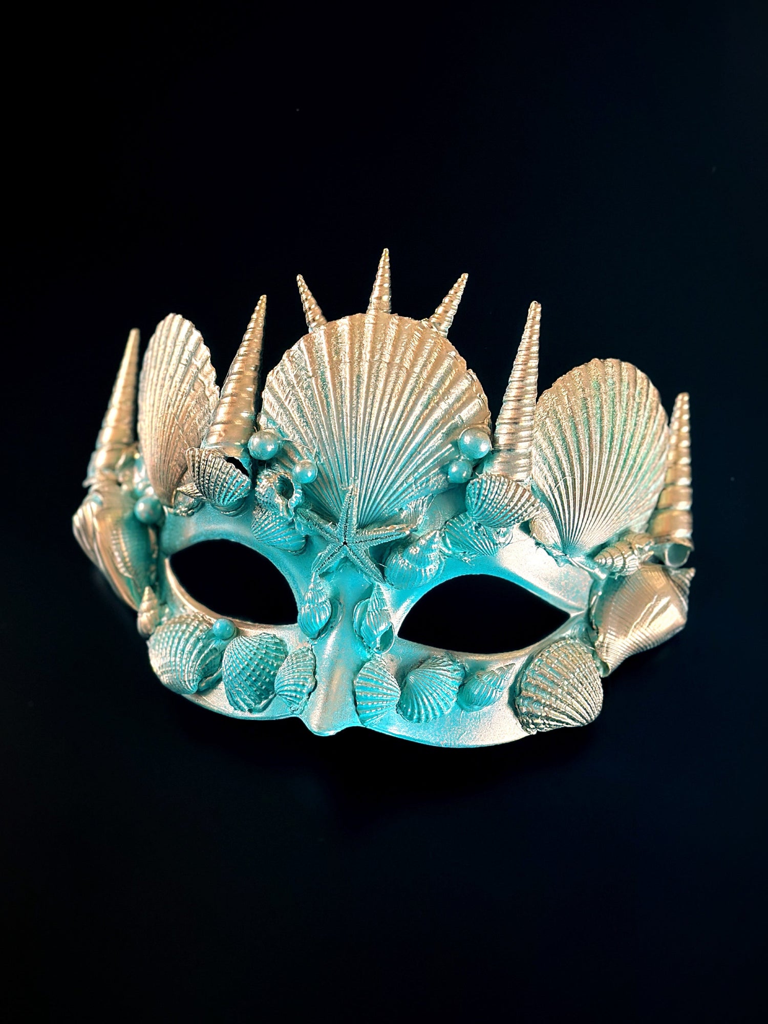 Mermaid masquerade mask with ivory seashells and spiked coral design