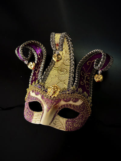 Men's masquerade mask in gold and purple.