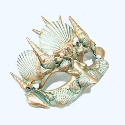 Men's King Triton masquerade mask in seafoam green and gold with pearls and shells.