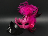 Elegant black couples masquerade mask set with feathered women’s mask and men’s classic mask, available in pink.
