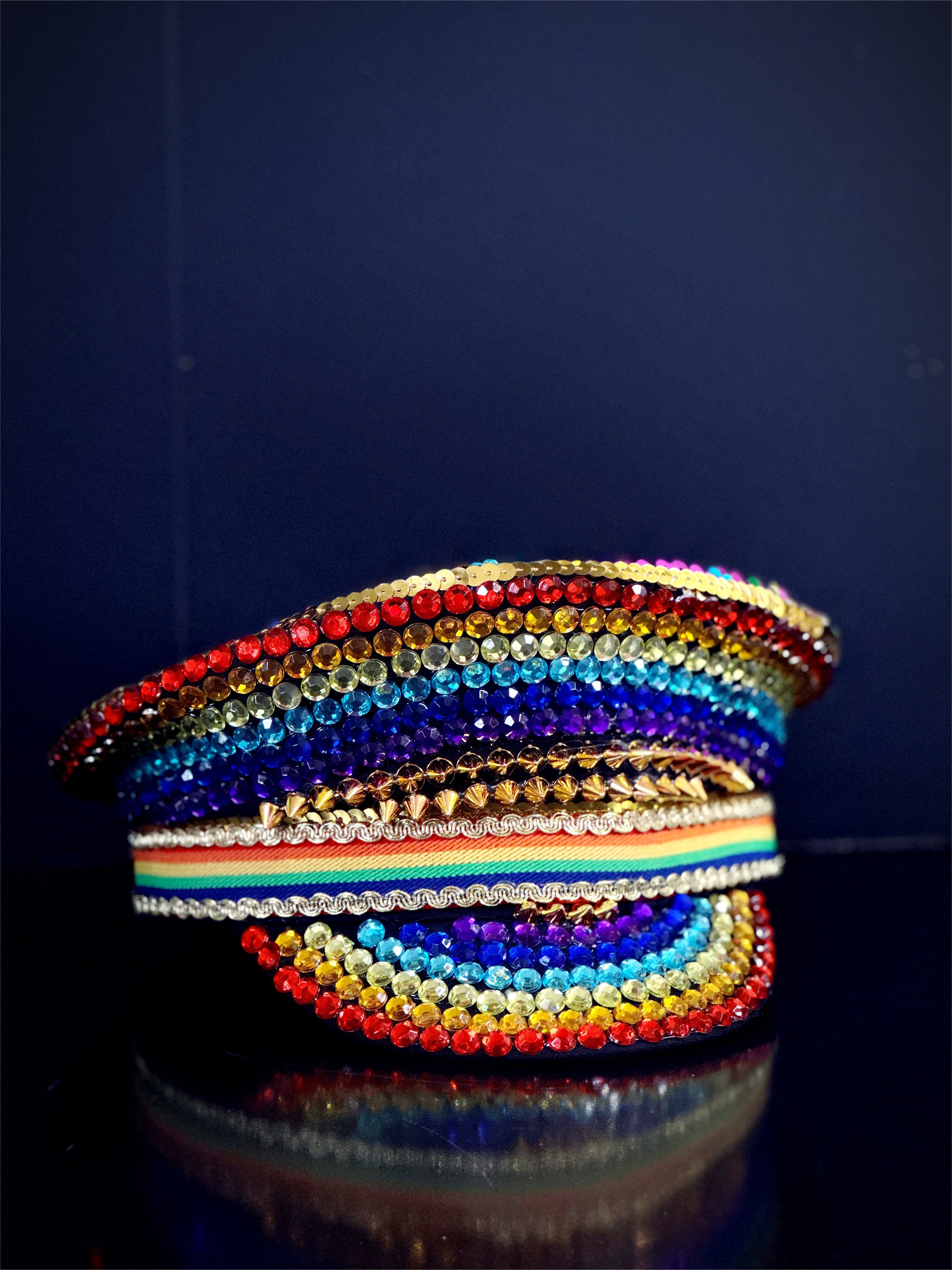 Sparkly rainbow gem hat with multicolor stones and glam pride flair, ideal for bold celebrations