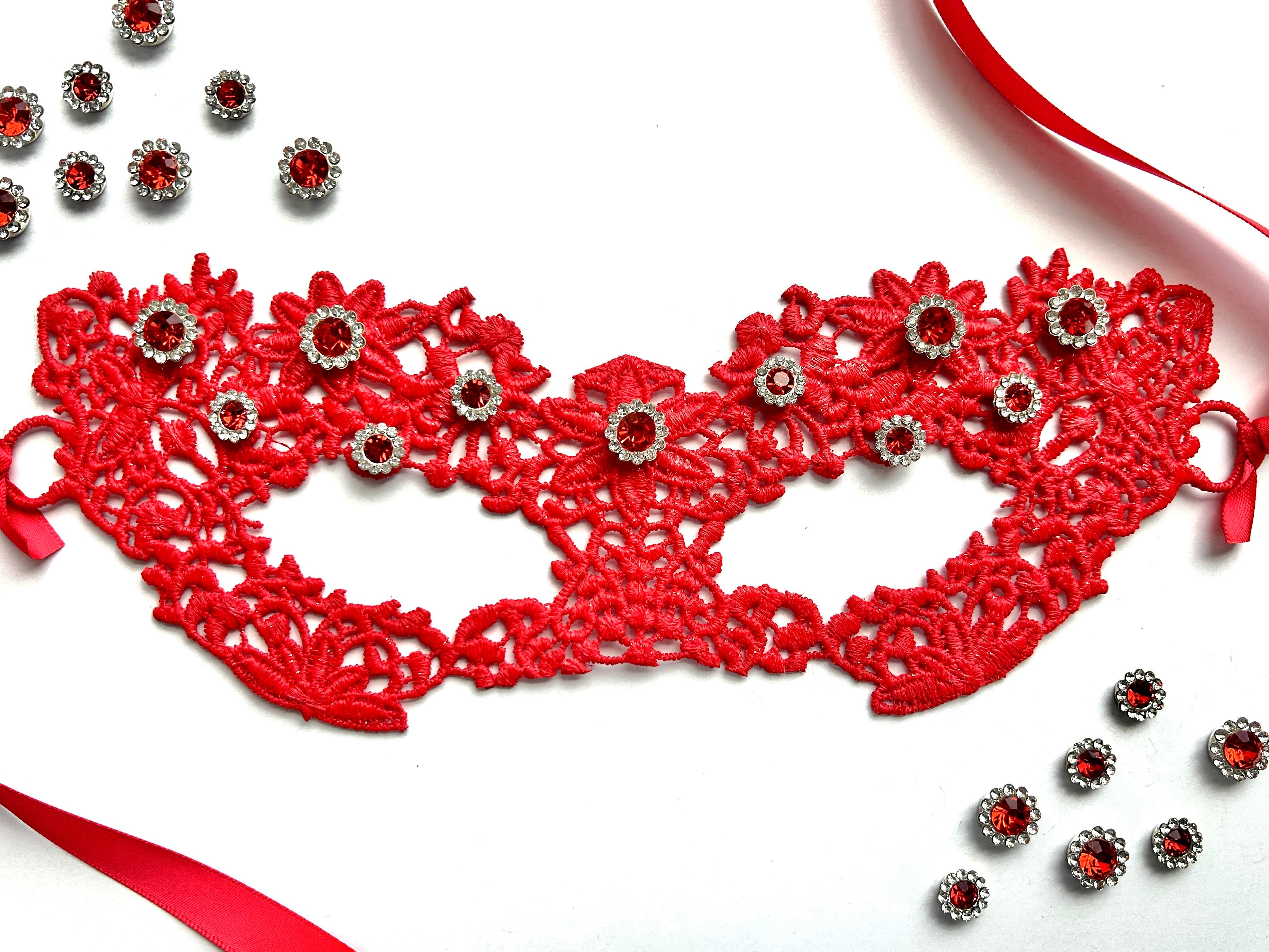Red floral lace masquerade mask with crimson rhinestones for gothic gala and Venetian ballroom events.