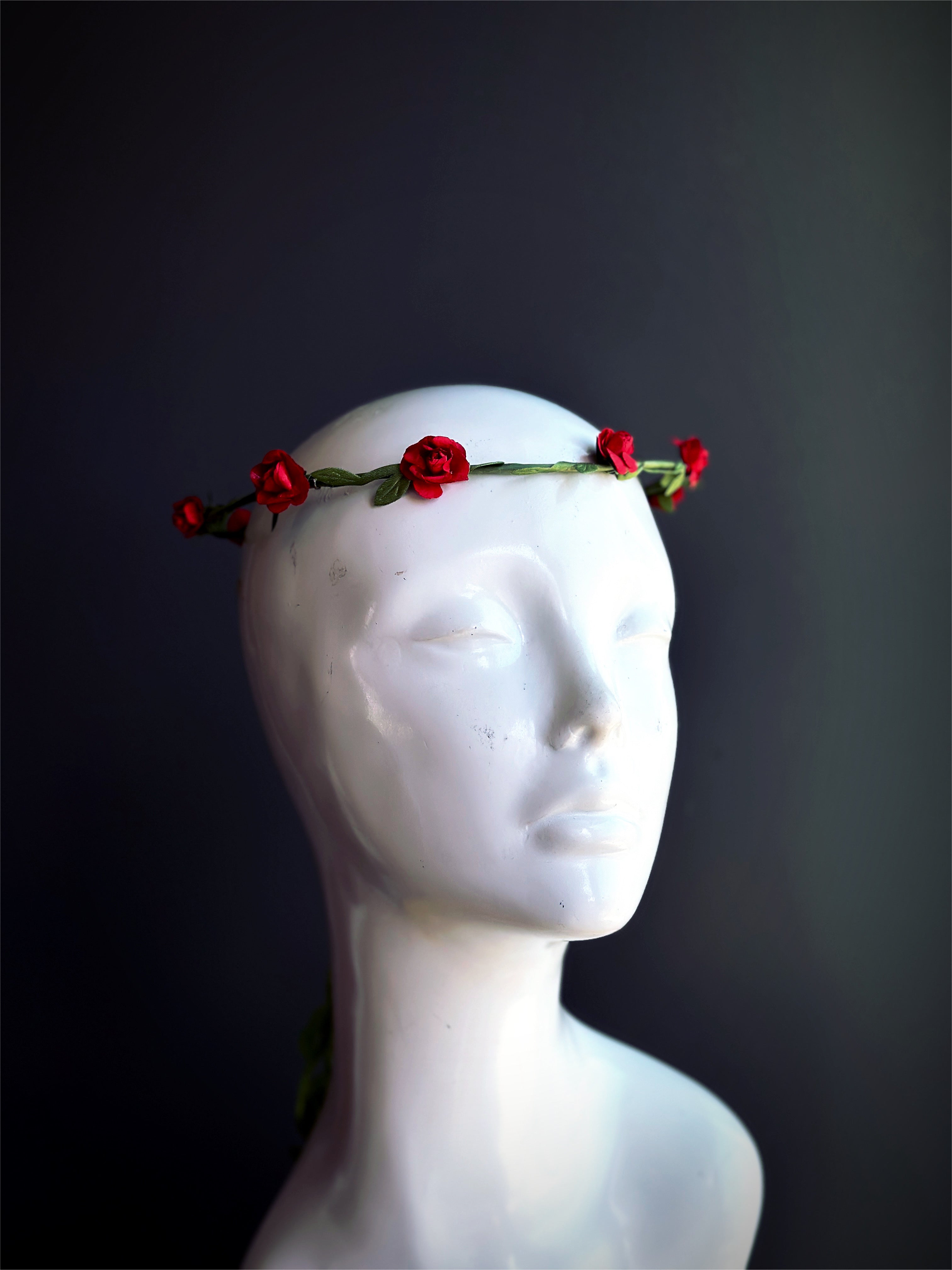Red rose flower crown headpiece with green stems for weddings, boho festivals, and renaissance costumes.