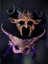 Gothic couples masquerade masks with black horns, purple feathers, and rose gold filigree