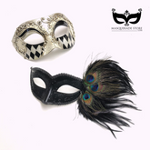Couple’s masquerade mask set featuring a men’s silver harlequin scrollwork mask and a women’s black glitter mask with peacock feathers.
