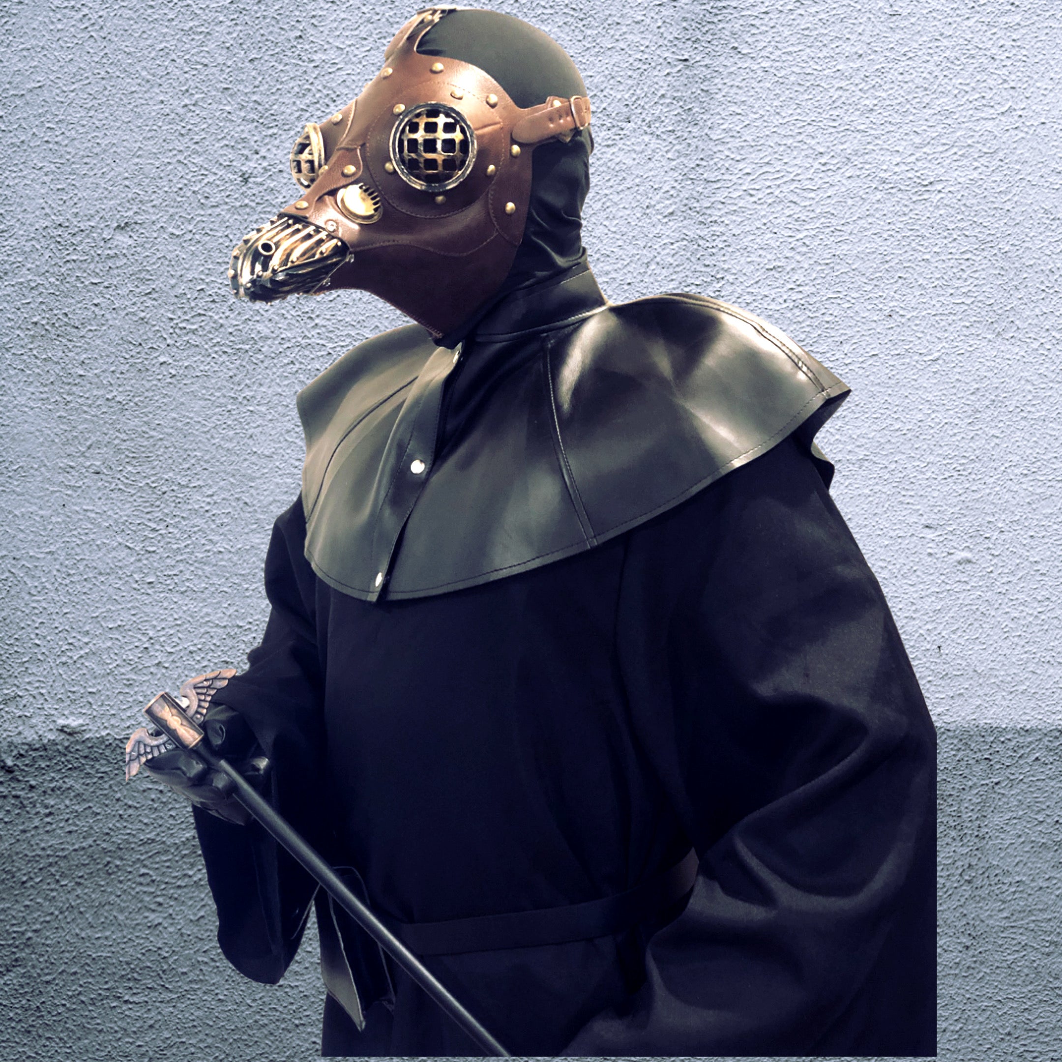Brown plague doctor mask with mesh goggles and black cloak costume