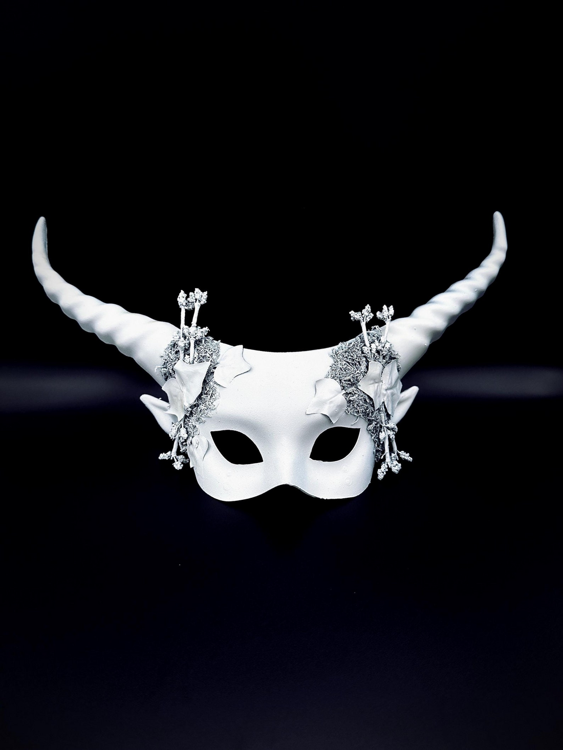 White horn masquerade headdress with silver ivy detailing, fantasy woodland mask for winter masquerade and cosplay.