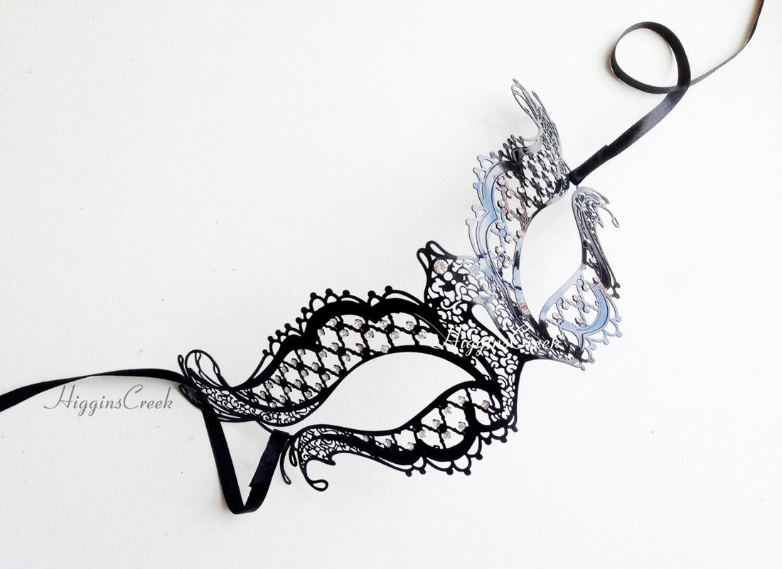 Womens metal masquerade mask in black with stones.