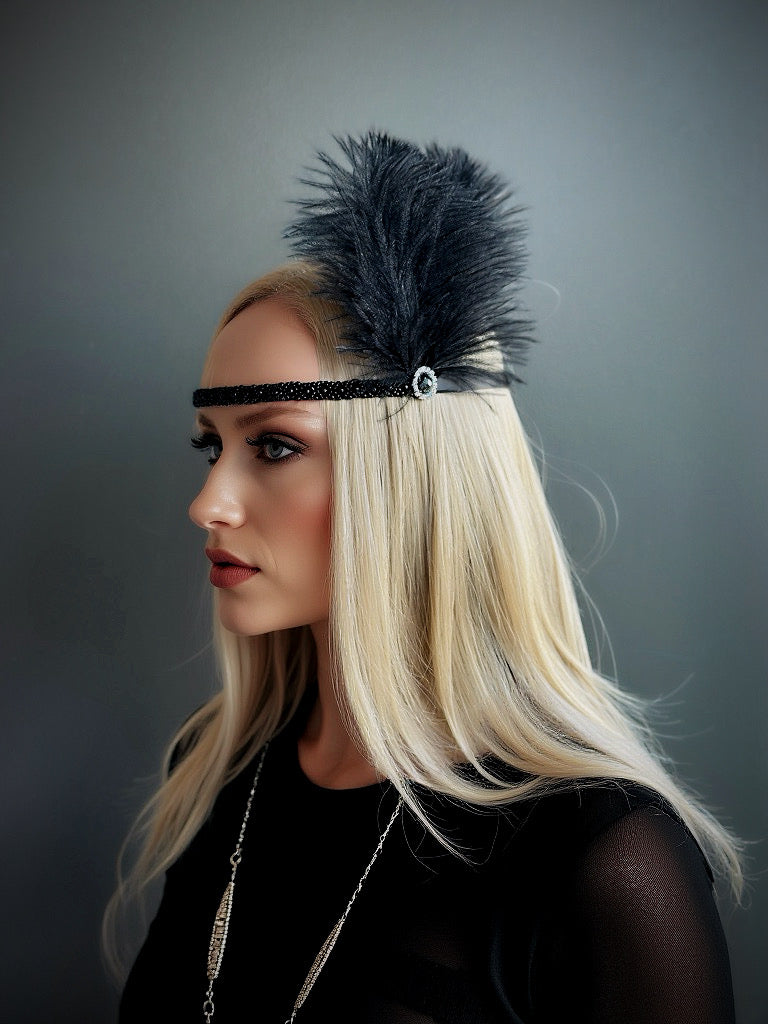Black feather Gatsby headband with a rhinestone accent, perfect for Gatsby-themed parties and weddings.