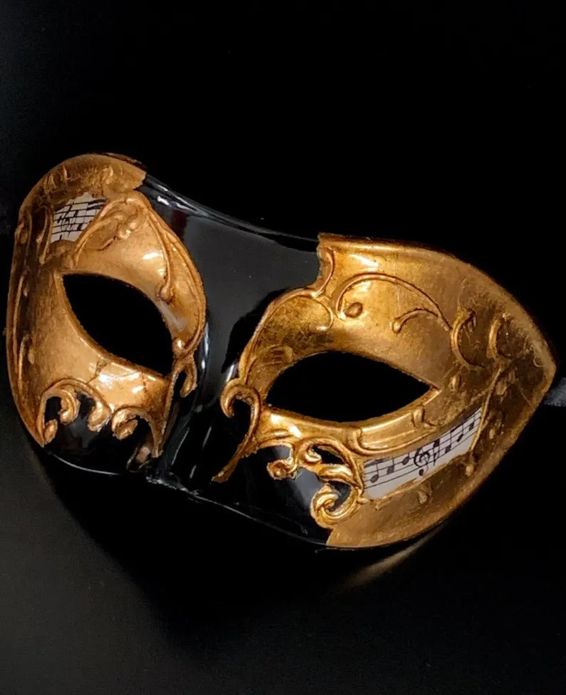 Black and gold Venetian masquerade mask with music notes for men’s opera, Carnival, and masquerade costumes.