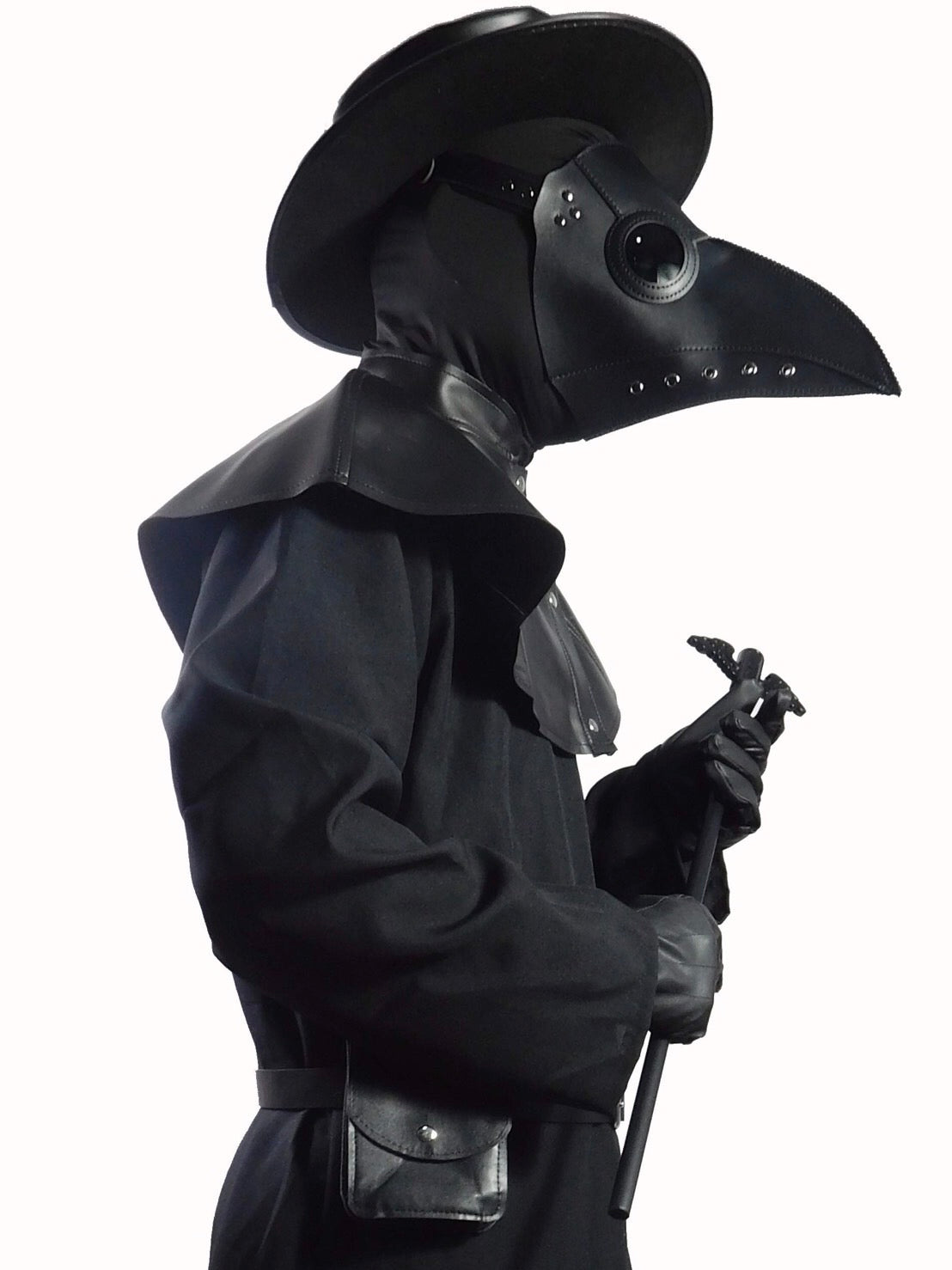 Complete black plague doctor costume with long cloak, gloves, hat, mask, staff, shoulder cape, pouch belt, and balaclava.