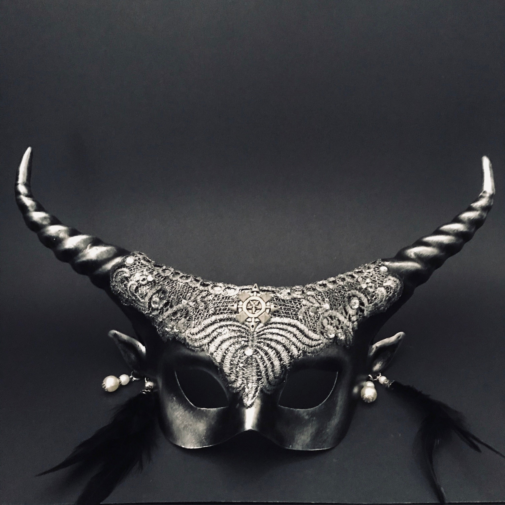 Black gothic womens masquerade masks with ram horns and lace.