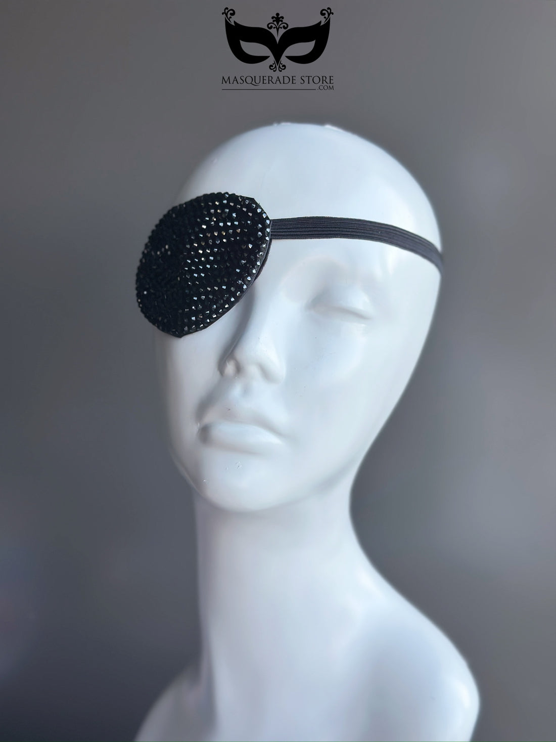 Black rhinestone masquerade eyepatch with sparkling details and elastic band, perfect for costume parties or masquerade events.
