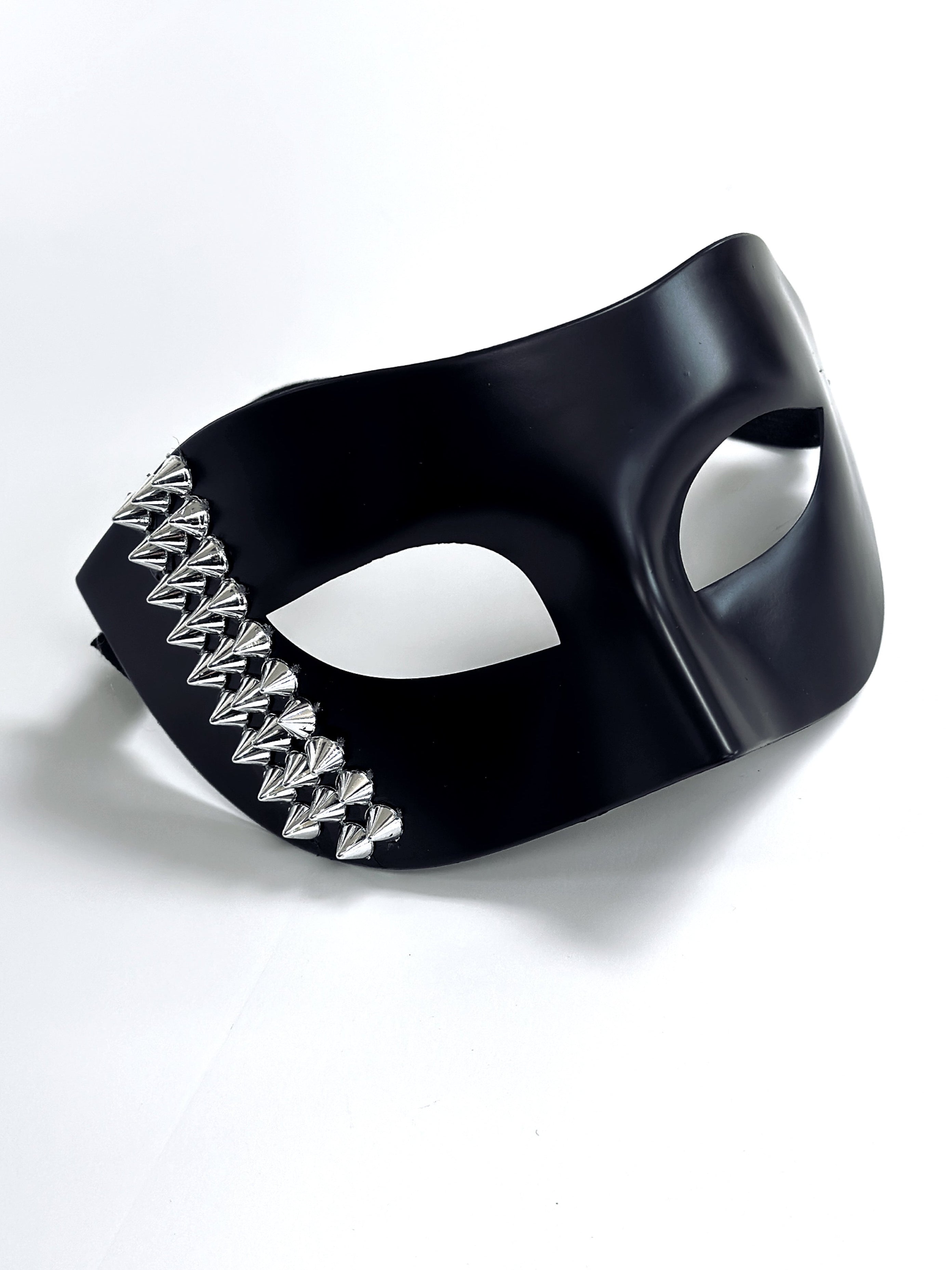 Black masquerade mask for men with silver stud details, perfect for edgy masquerade looks