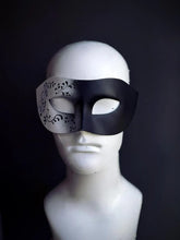 Black and silver Venetian masquerade mask with swirl detail, men’s elegant half-face mask.