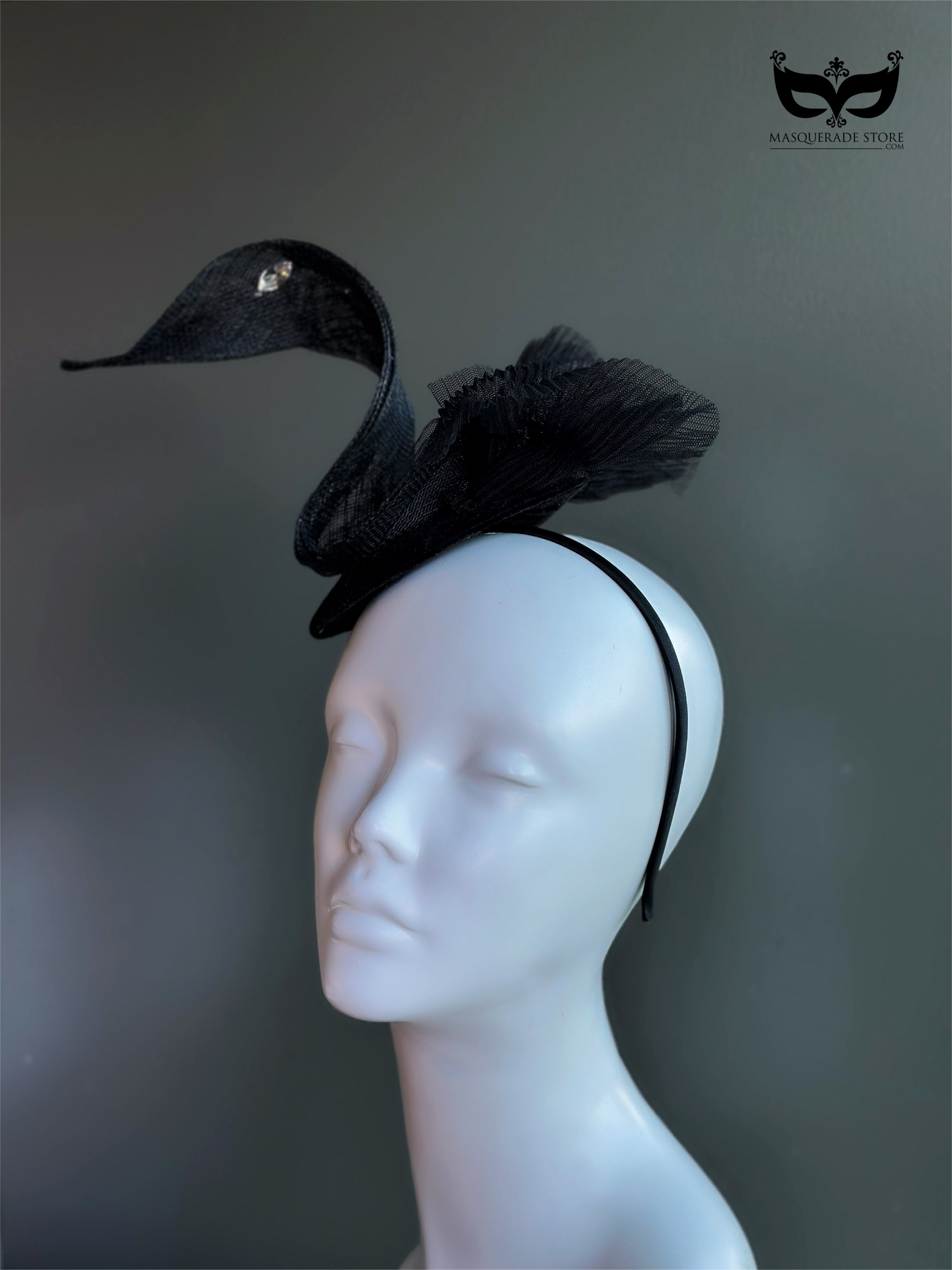 Black swan sculptural fascinator headband with curved mesh silhouette and crystal accent