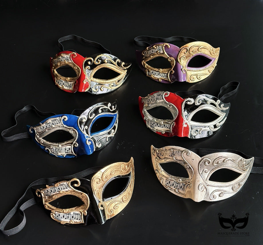 Bulk Venetian Phantom masquerade masks featuring musical sheet artwork, raised baroque scrollwork, and elegant hand-painted finishes in assorted colors.
