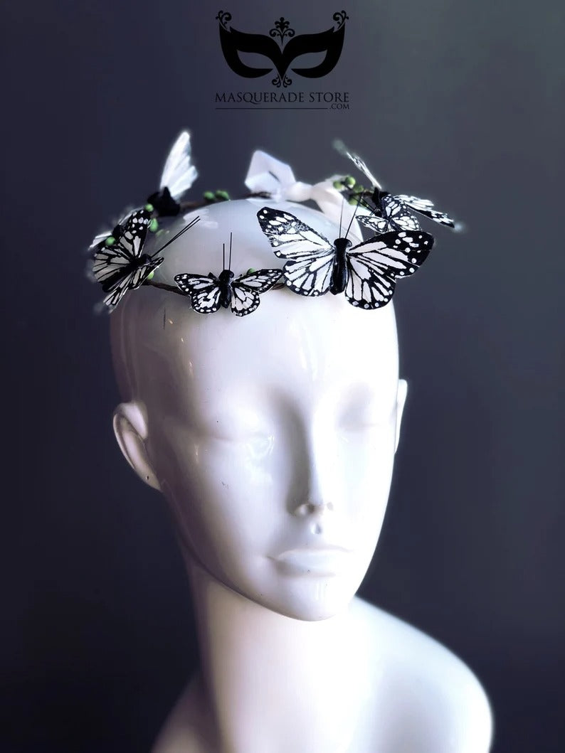 Black and white butterfly headband with satin ribbon tie for fairy costumes and festivals.