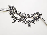 Elegant black butterfly lace masquerade mask with rhinestones for women’s prom, ball, or party.