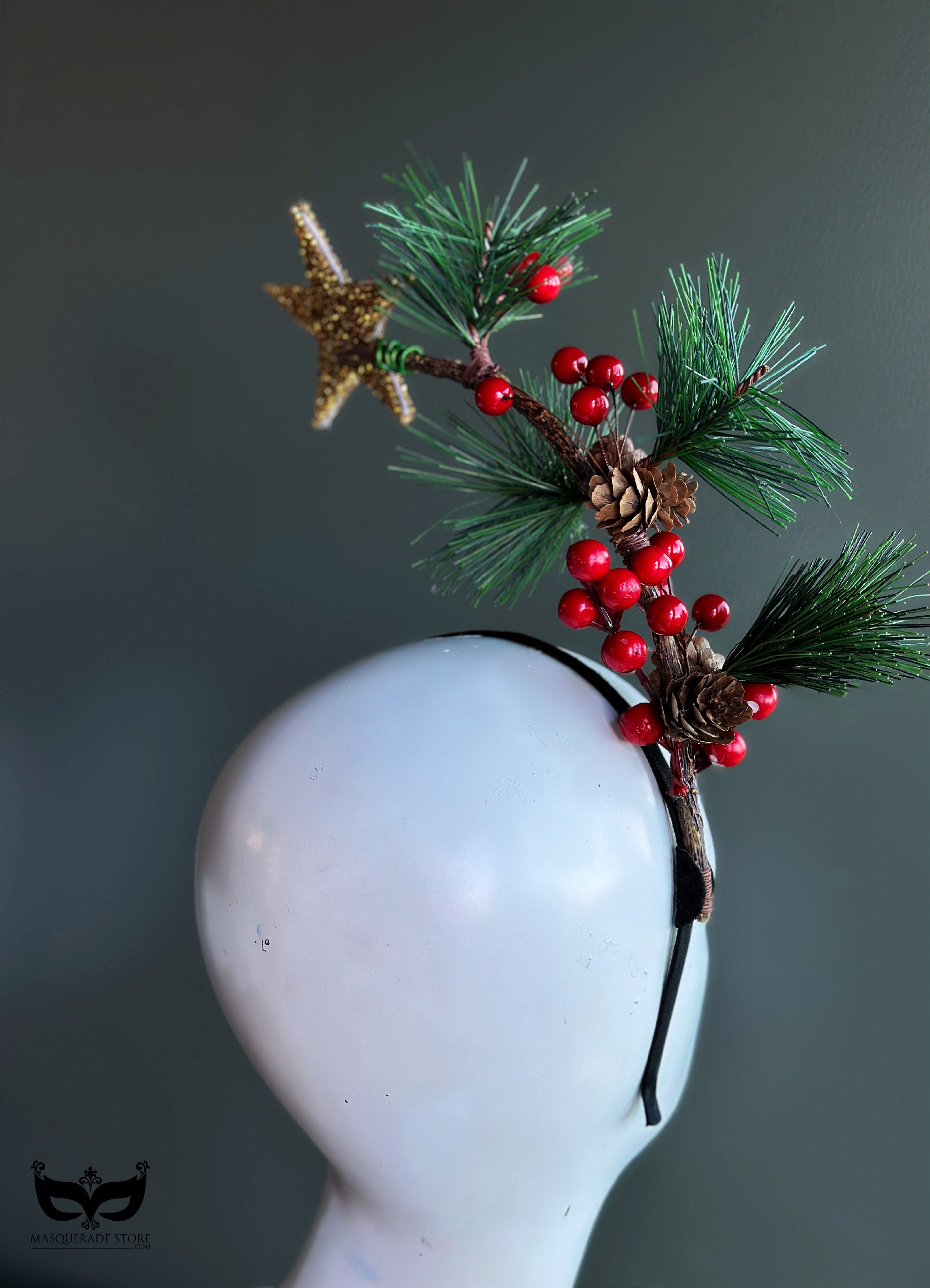 Christmas headband with gold star pine needles red berries and pinecones for holiday outfits and winter parties