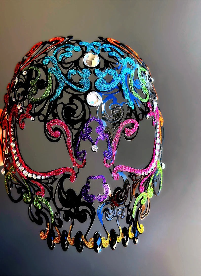 Rainbow glitter sugar skull masquerade mask with rhinestones, designed for Mardi Gras, Carnival, and Day of the Dead.
