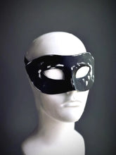 Men’s distressed black Venetian masquerade mask with vintage worn leather effect.