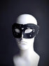 Men’s distressed black Venetian masquerade mask with vintage worn leather effect.