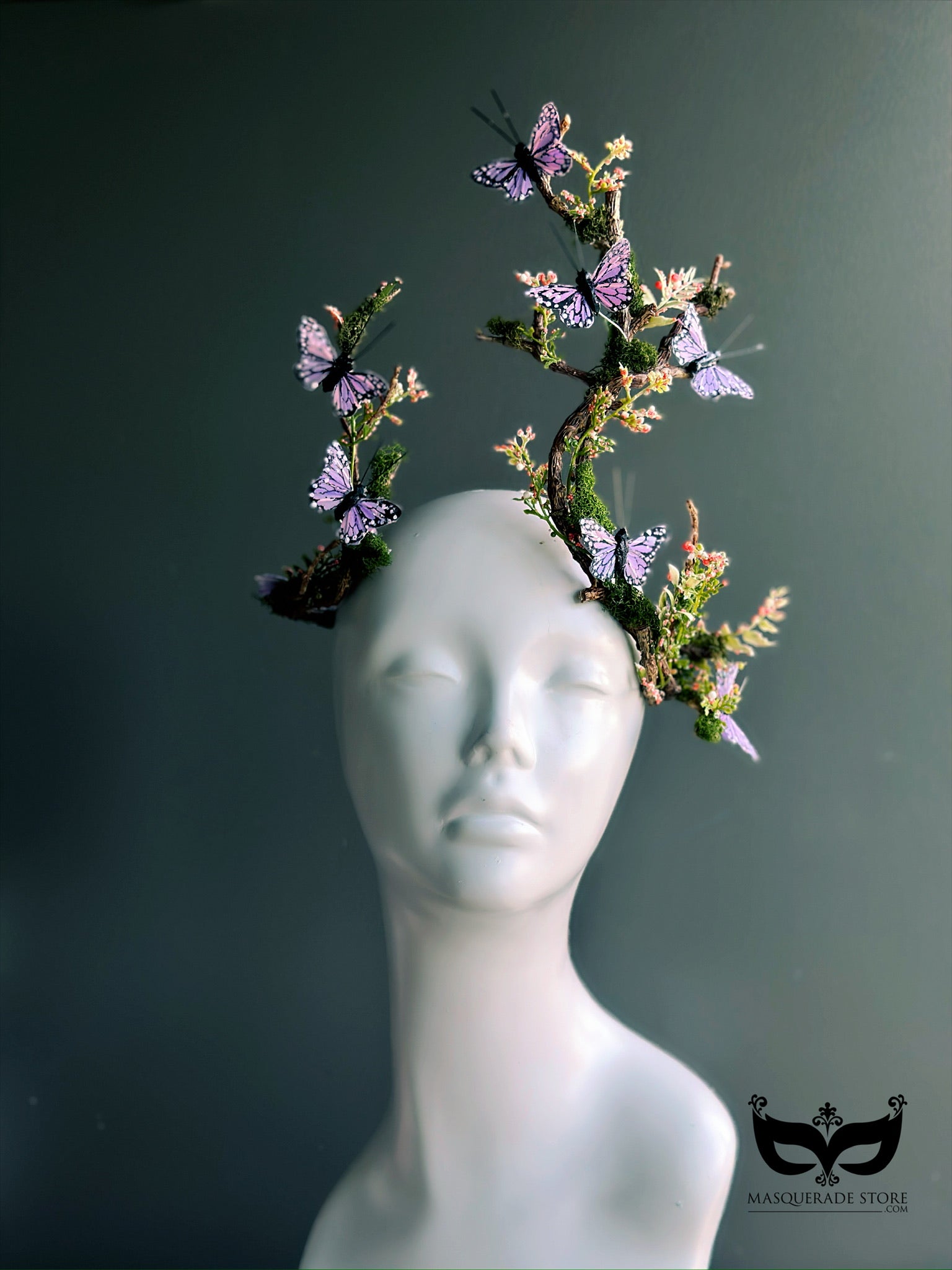 Woodland fantasy headdress with purple butterflies, mossy vines, and flowers for fairy costumes and forest-themed events