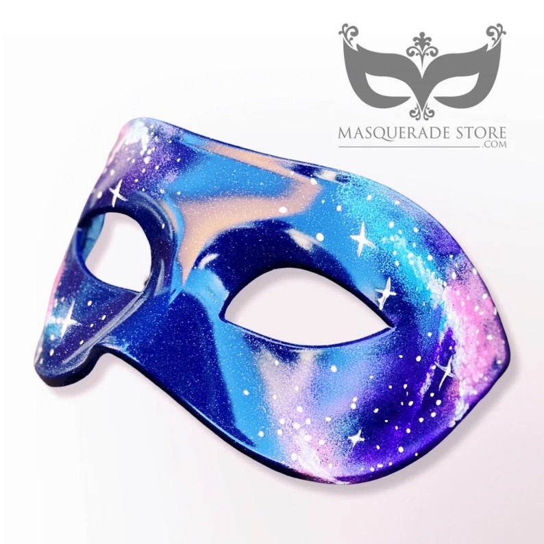 Nebula galaxy masquerade mask painted in blue, purple, and pink with starry cosmic details for masquerade, festivals, or cosplay.