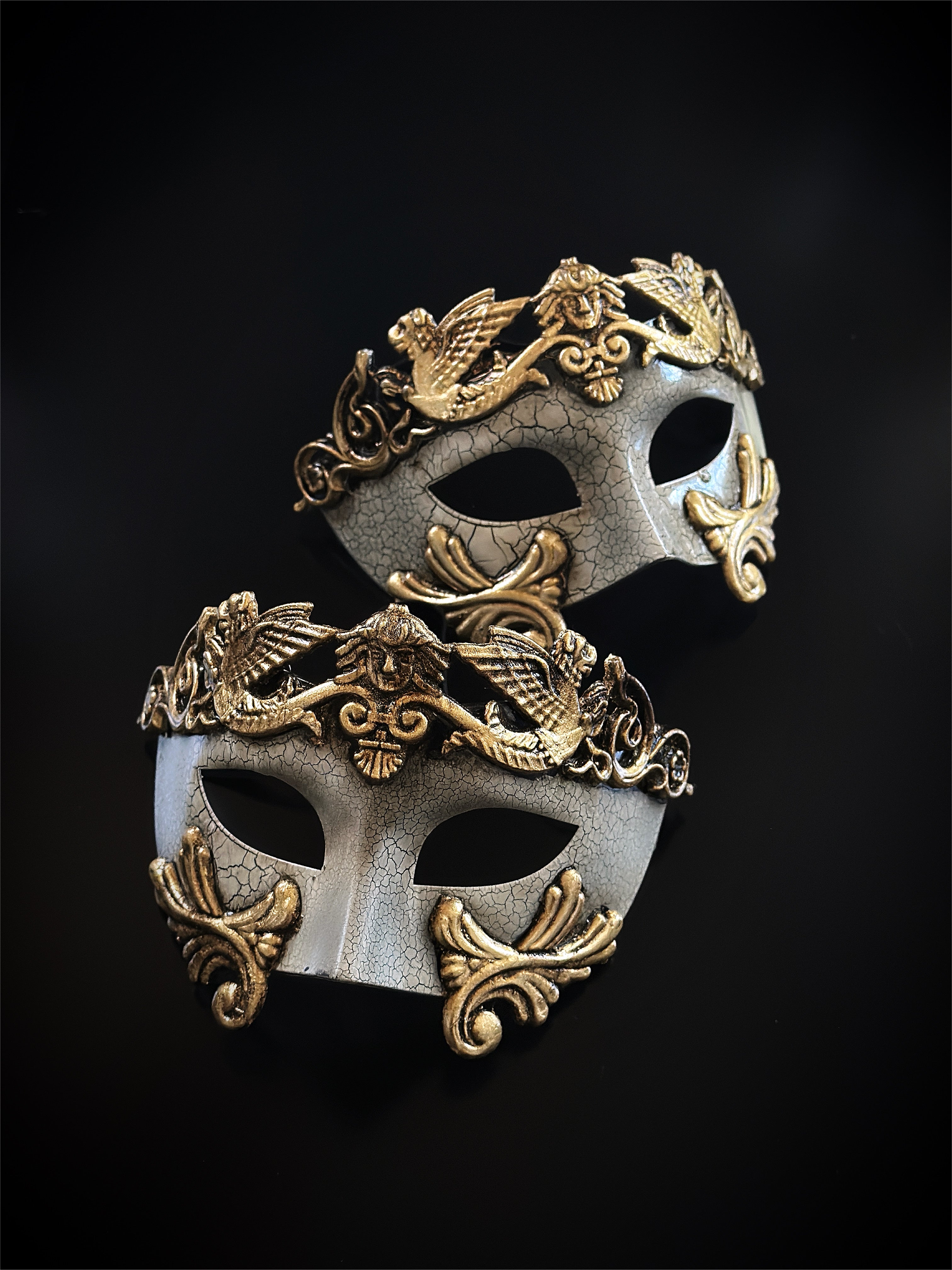 Gold Roman gladiator masquerade mask with crackle finish and ornate scroll details for a bold and majestic style.