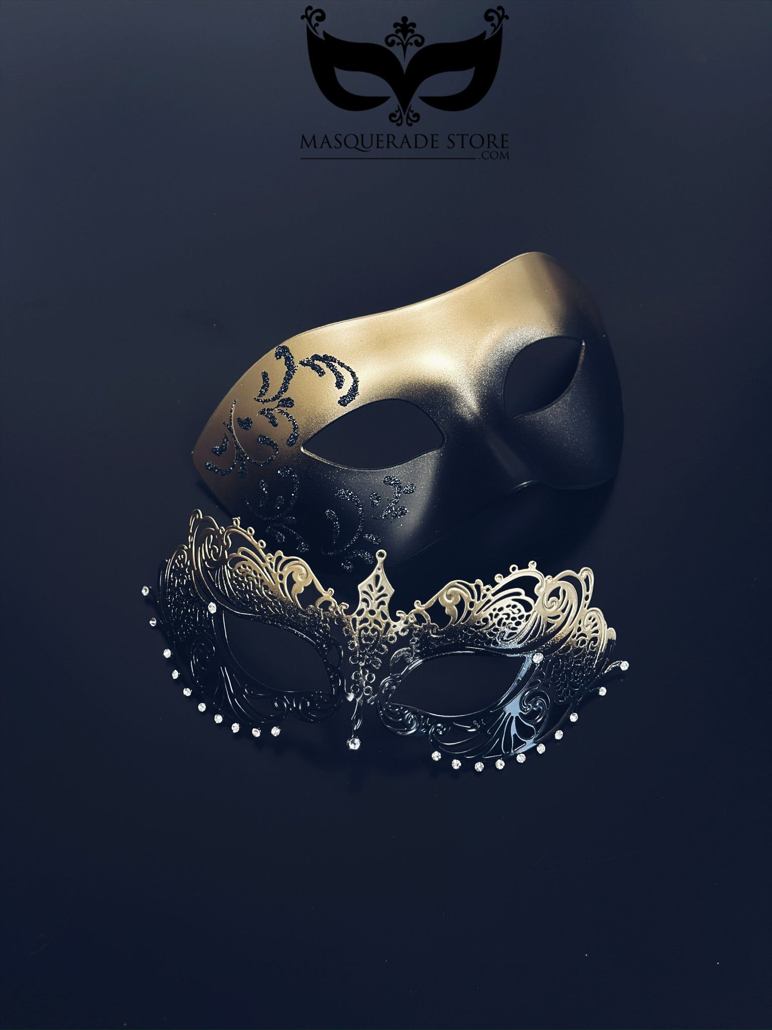 Gold and black with black filigree mask for men and a gold ombre laser cut metal mask with rhinestones for women