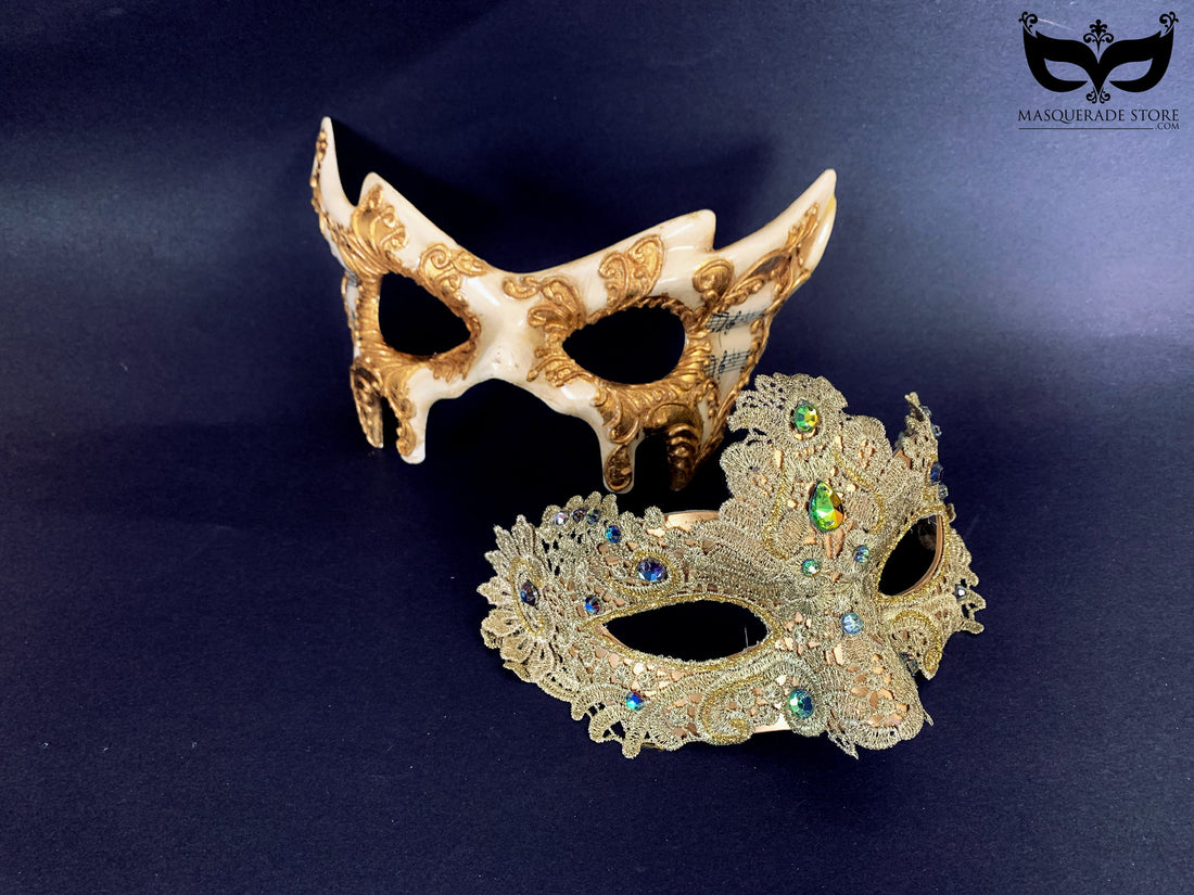 Gold lace mask with colorful crystals paired with an antique-style mask featuring music notes.