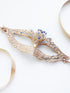 Elegant gold lace masquerade mask with sparkling blue rhinestones, Venetian-style lace eye mask for women, ideal for weddings, Halloween, prom, and masquerade parties.