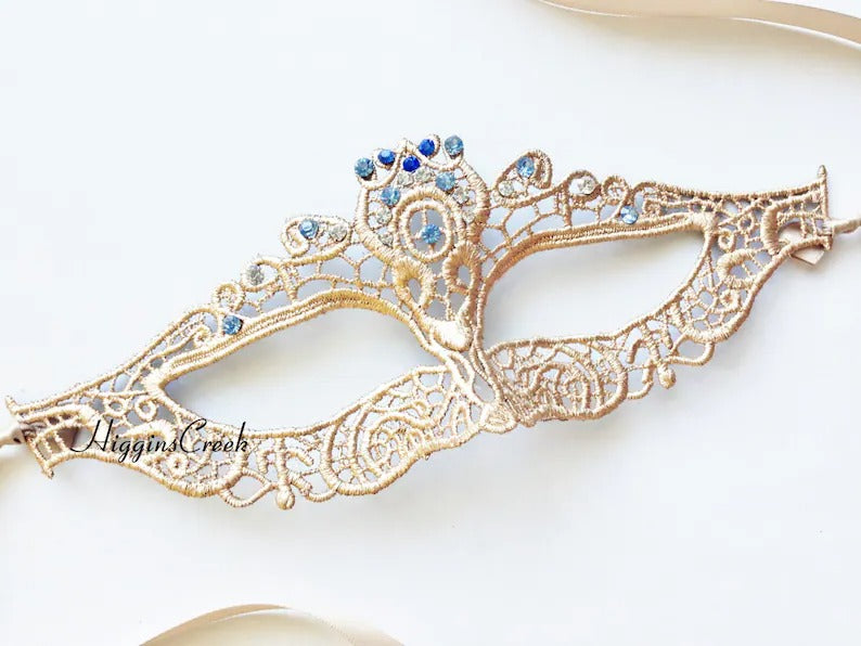 Elegant gold lace masquerade mask with sparkling blue rhinestones, Venetian-style lace eye mask for women, ideal for weddings, Halloween, prom, and masquerade parties.