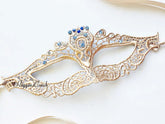 Elegant gold lace masquerade mask with sparkling blue rhinestones, Venetian-style lace eye mask for women, ideal for weddings, Halloween, prom, and masquerade parties.