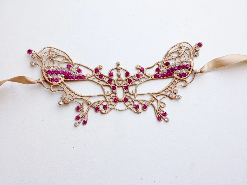 Gold lace masquerade mask available plain or with sparkling rhinestone accents.
