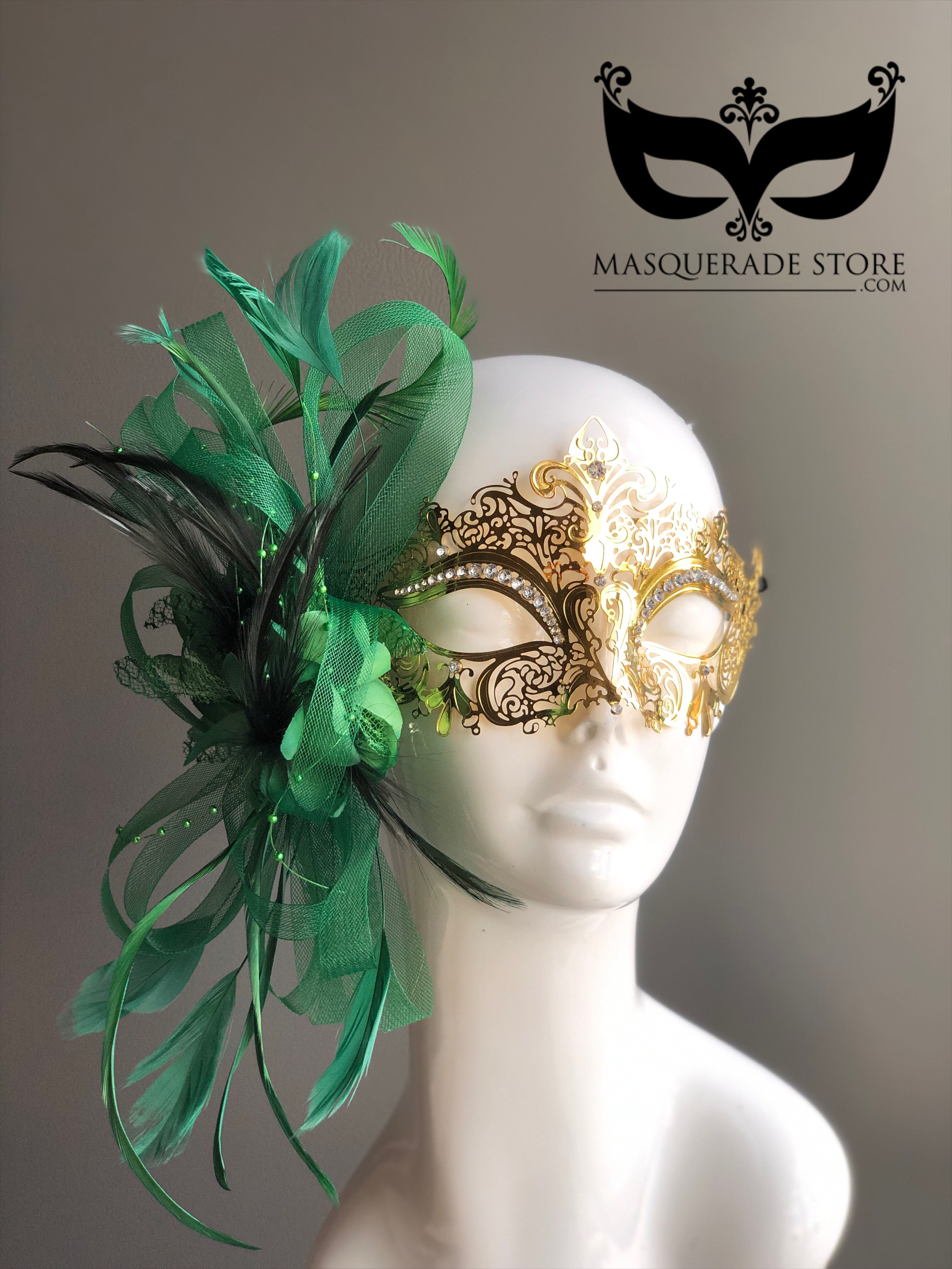 Gold Mardi Gras mask with intricate detailing and green feather embellishment, perfect for masquerade balls and Mardi Gras celebrations.